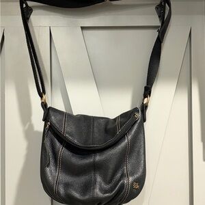 The Sak Black Leather Shoulder Bag with Gold Details